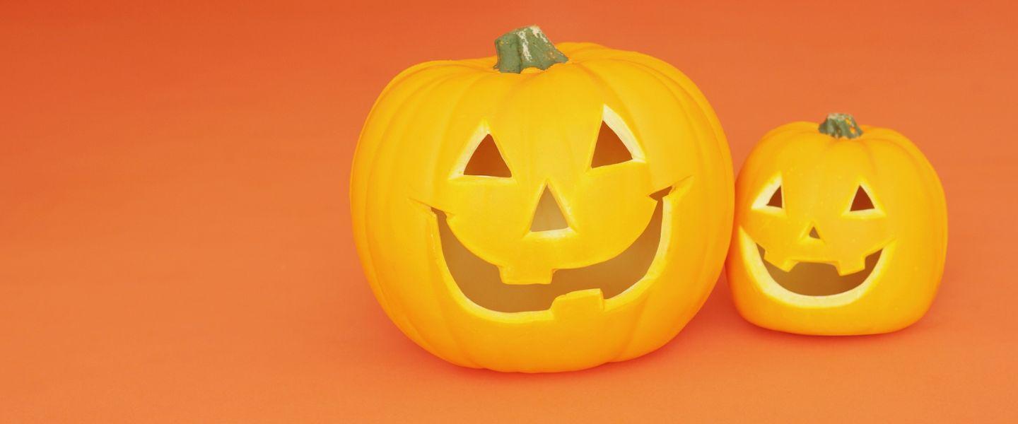 two smiling pumpkins