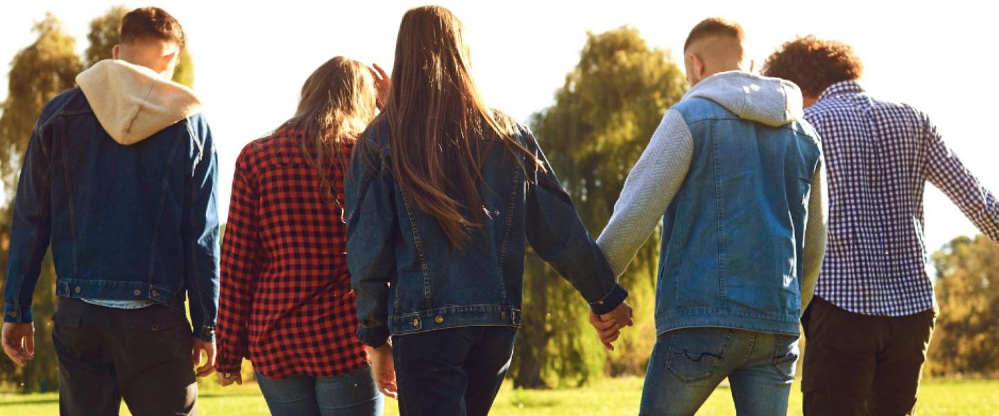 young people walking outside